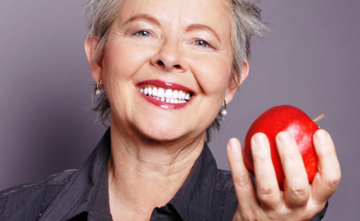 dca-blog_dentures-mature-woman-apple